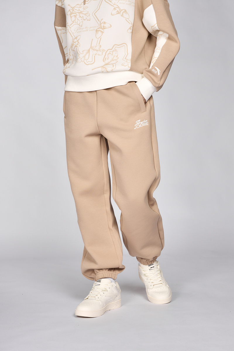 Брюки женские трикотажные ANTA Knit Track Pants (Buckwheat Grey)